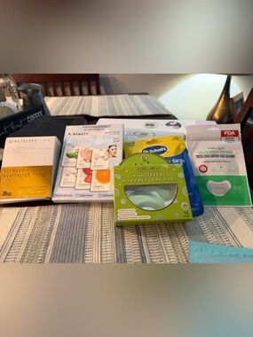 Several different skincare products.under eye patches, face masks, some reusable